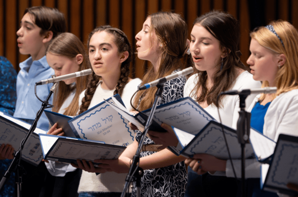 Kol Machar teens singing at Chanukah 2023